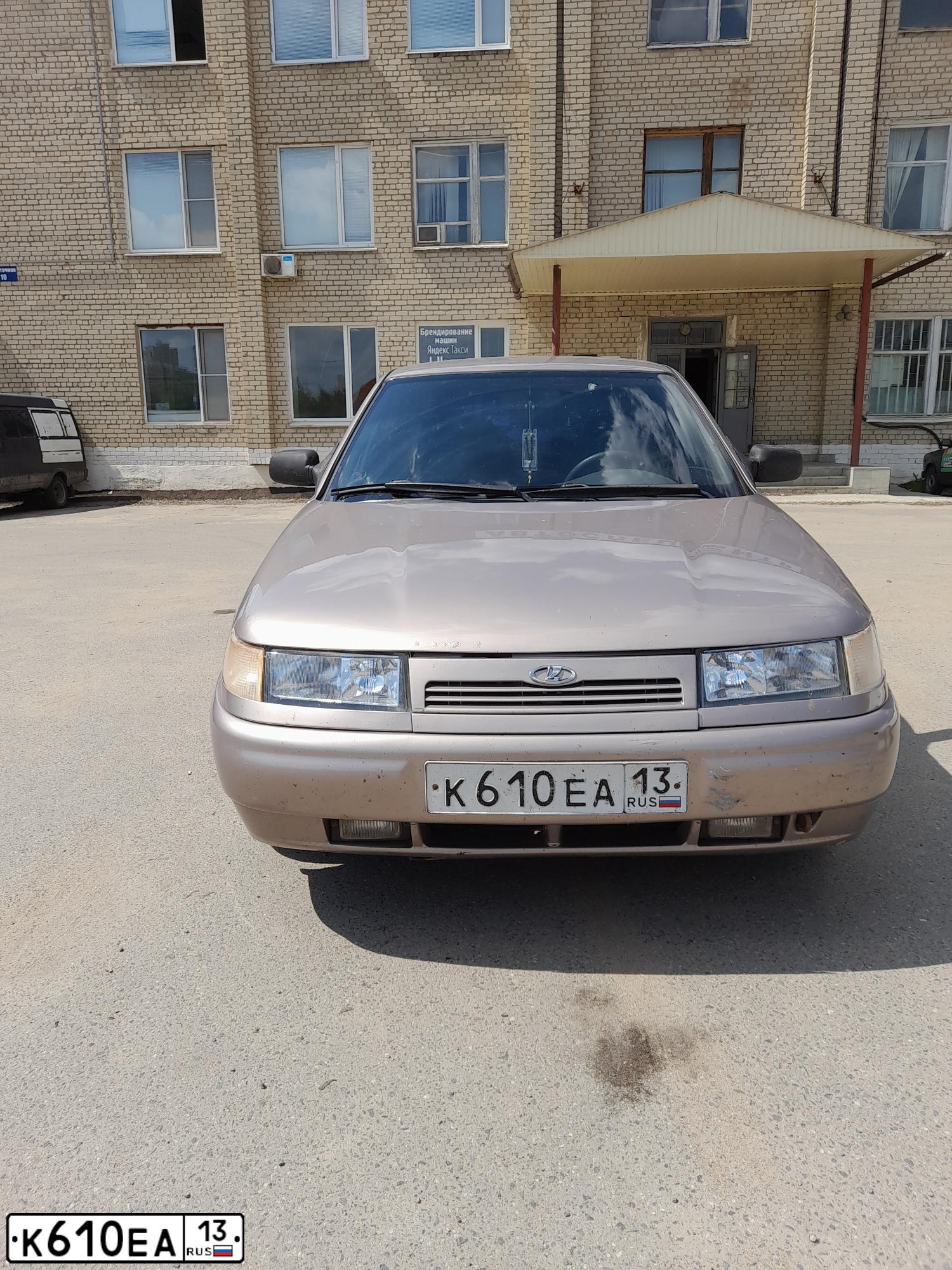 Фото автомобиля LADA 2112 LADA, 2007 — госномер Х302КМ150. Цвет: БЕЖЕВО - СИРЕНЕВЫЙ