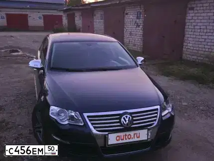 Фото автомобиля OPEL ASTRA, 2009 — госномер Е072ХЕ199. Цвет: ЧЕРНЫЙ