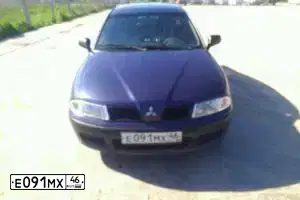 Фото автомобиля MITSUBISHI CARISMA, 2001 — госномер Н458СА33. Цвет: СИНИЙ ТЕМНЫЙ