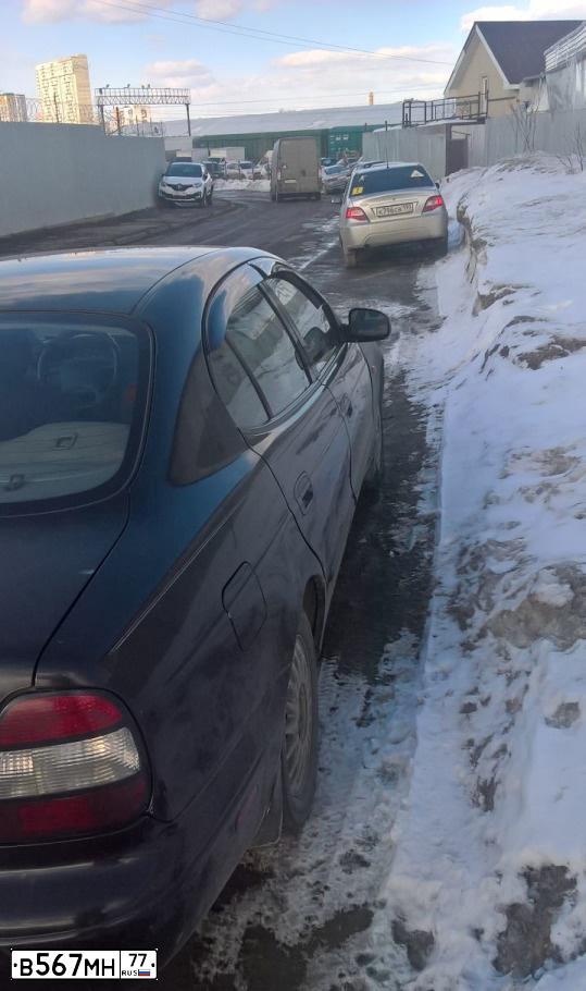 Фото автомобиля DAEWOO LEGANZA, 2000 — госномер Е582УТ97. Цвет: ЧЕРНЫЙ