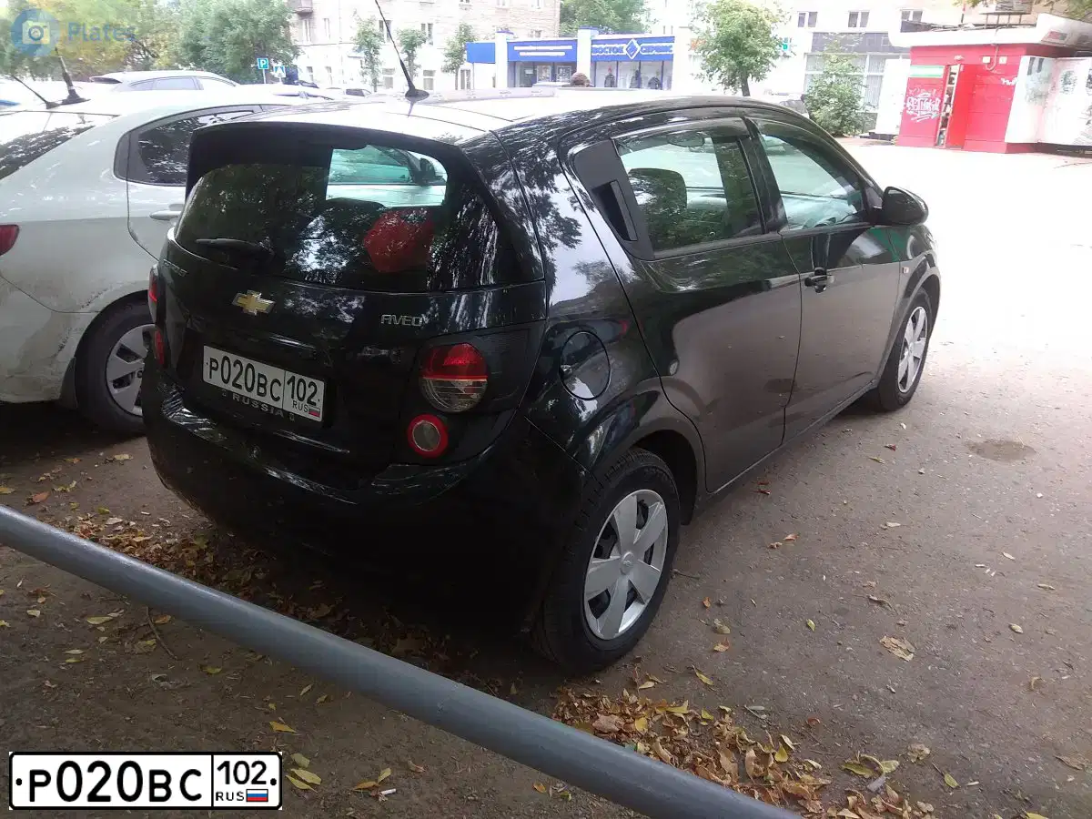Фото автомобиля CHEVROLET AVEO, 2013 — госномер Р020ВС102. Цвет: ЧЕРНЫЙ МАТОВО-ЧЕРНЫЙ