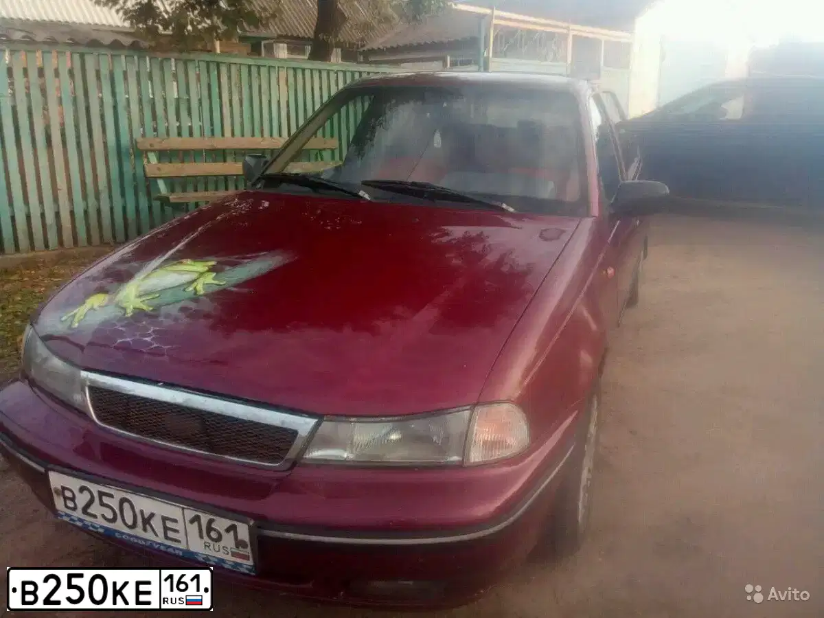Фото автомобиля DAEWOO NEXIA, 2004 — госномер В250КЕ161. Цвет: СПЕЛАЯ ВИШНЯ