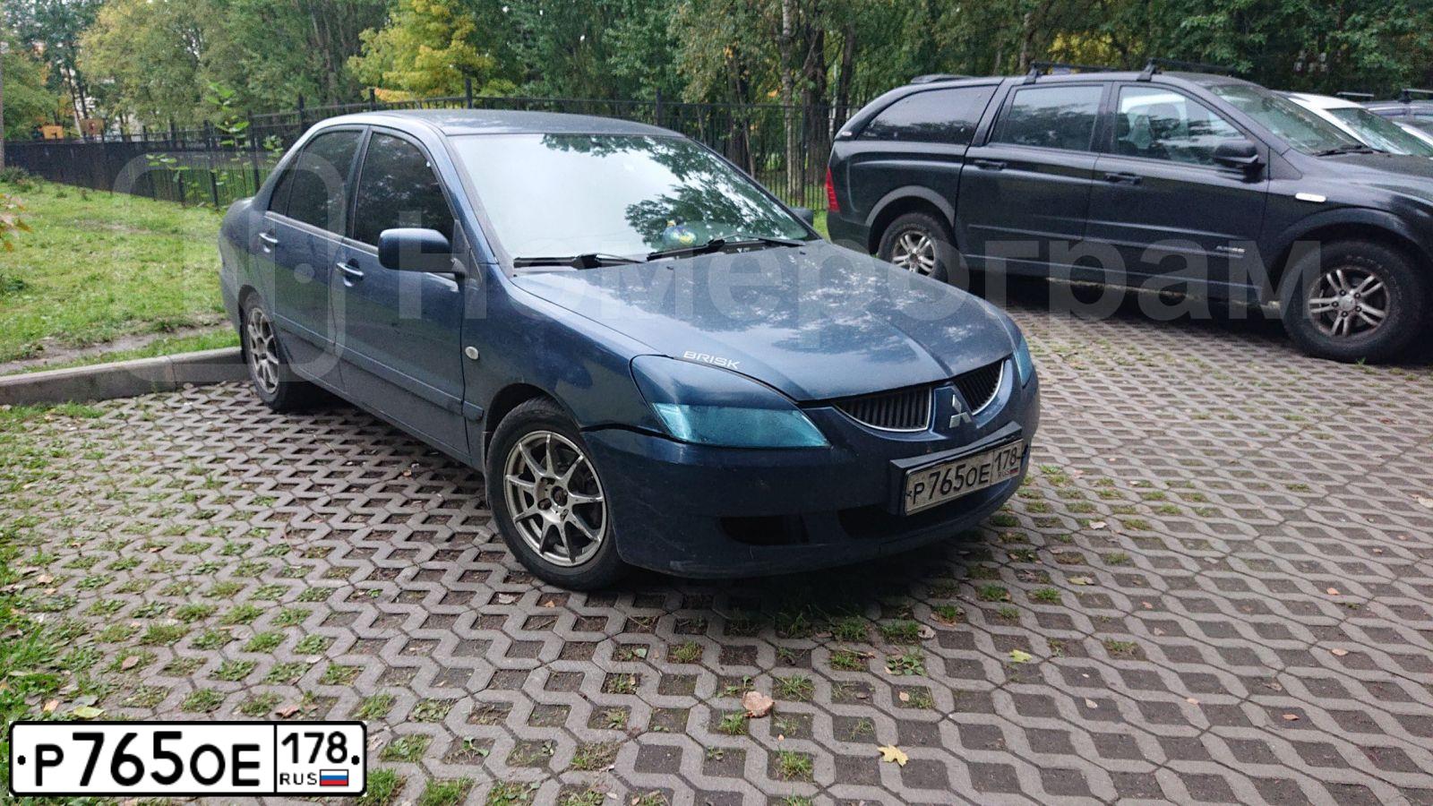 Фото автомобиля MITSUBISHI LANCER, 2005 — госномер А446УВ92. Цвет: синий