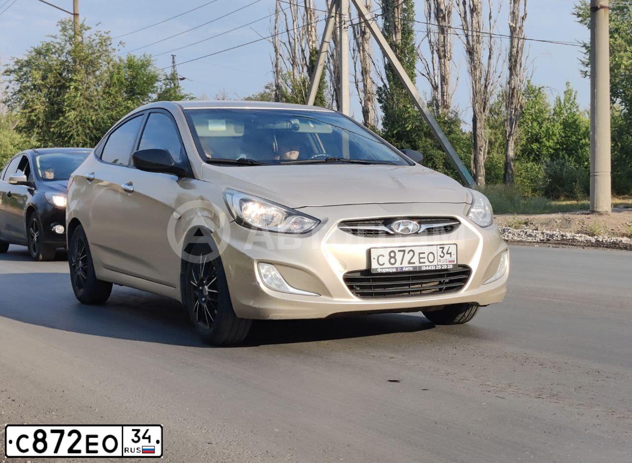 Фото автомобиля HYUNDAI SOLARIS, 2011 — госномер С872ЕО34. Цвет: БЕЖЕВО-СЕРЫЙ