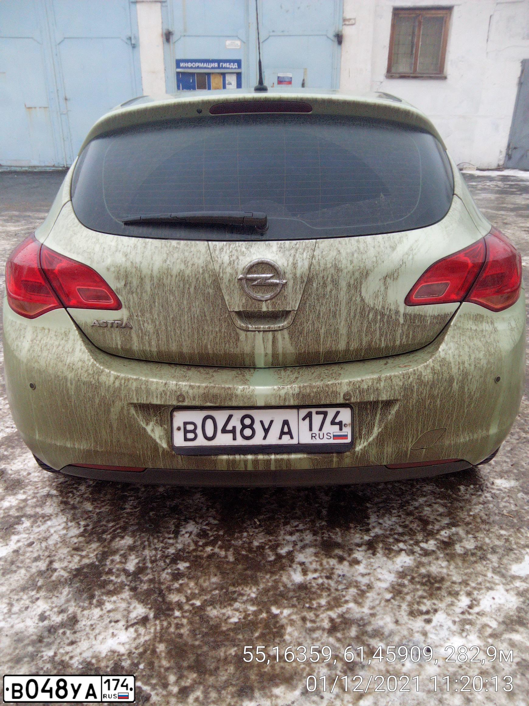 Фото автомобиля OPEL ASTRA, 2010 — госномер В048УА174. Цвет: СЕРО-ЗЕЛЕНЫЙ