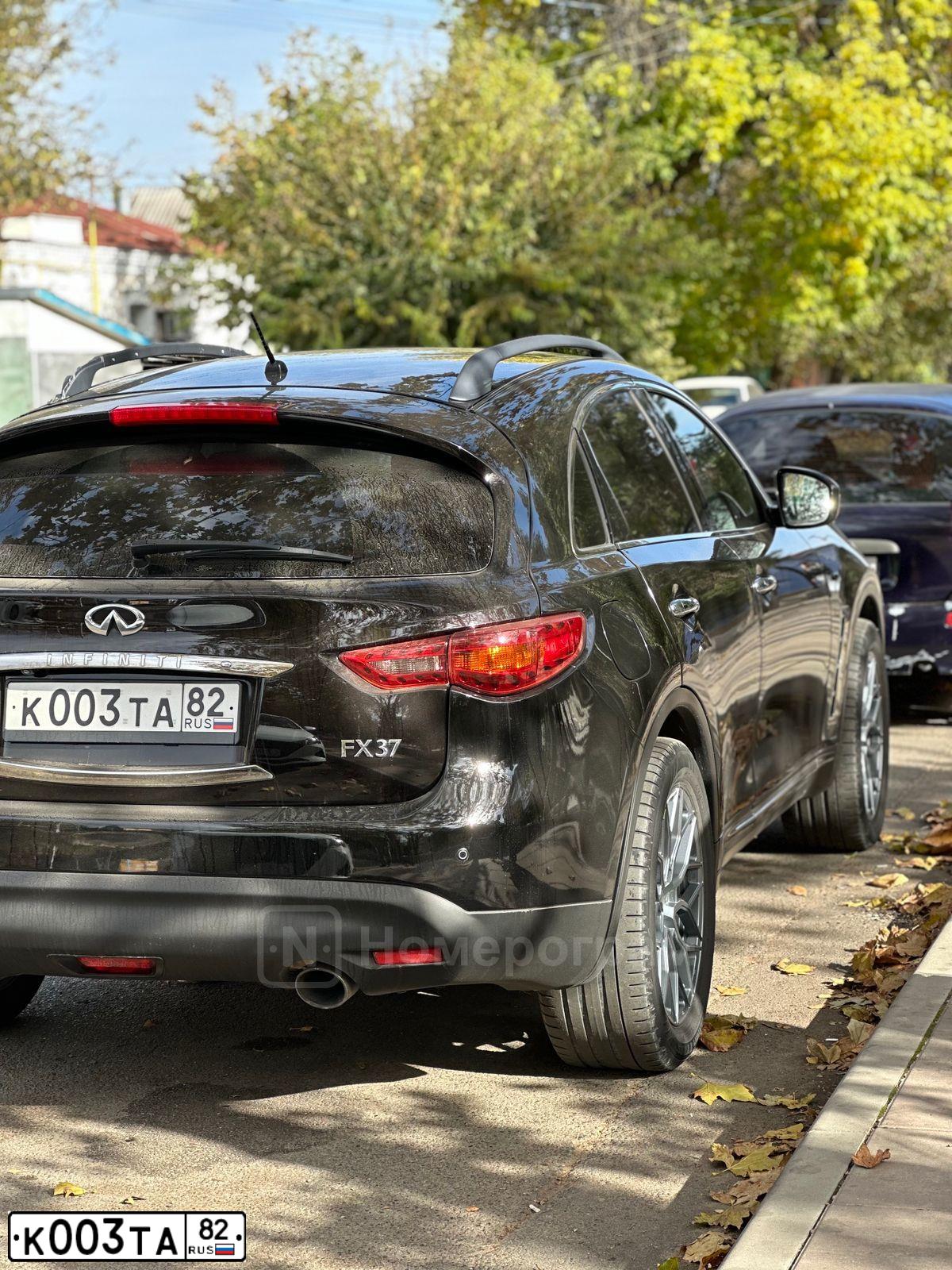 Фото автомобиля NISSAN NAVARA, 2007 — госномер В418АО92. Цвет: СЕРЫЙ