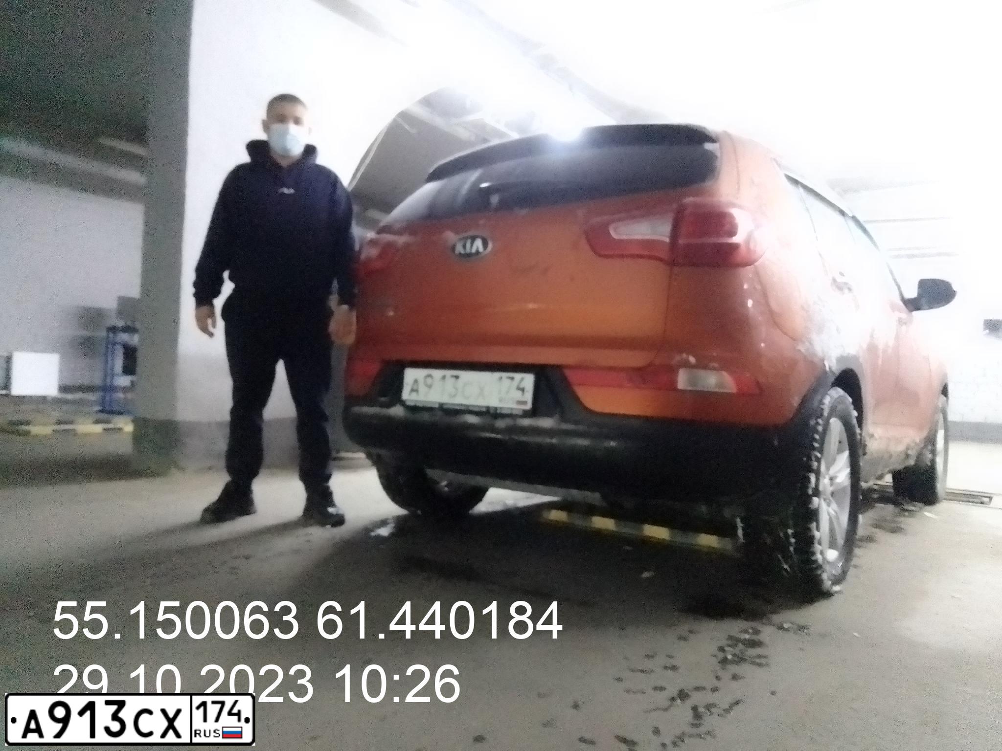 Фото автомобиля KIA SPORTAGE, 2013 — госномер К606КН774. Цвет: Оранжевый