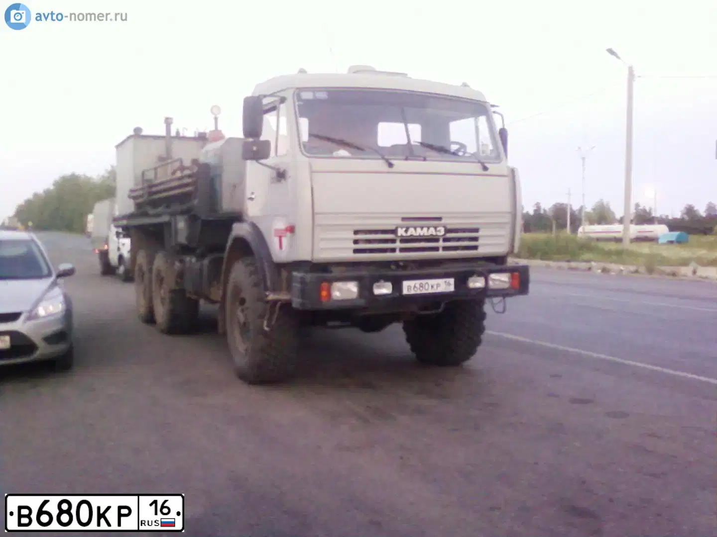 Фото автомобиля KAMAZ 43114 /6X6/, 2003 — госномер М291РР198. Цвет: СВ ДЫМКА