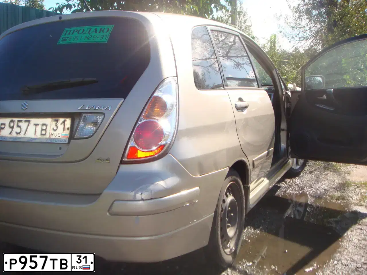 Фото автомобиля SUZUKI LIANA, 2005 — госномер Р957ТВ31. Цвет: БЕЖЕВЫЙ
