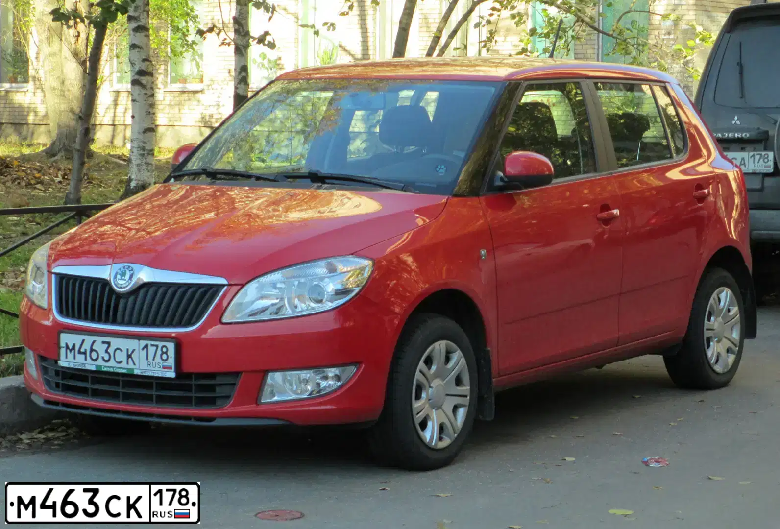 Фото автомобиля SKODA FABIA, 2012 — госномер О373МН71. Цвет: Красный