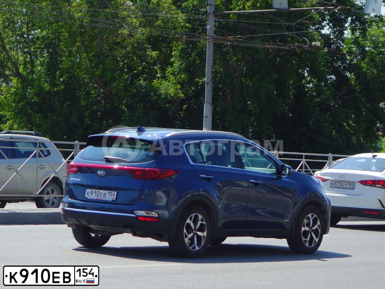 Фото автомобиля KIA SPORTAGE, 2020 — госномер К910ЕВ154. Цвет: ТЕМНО СИНИЙ