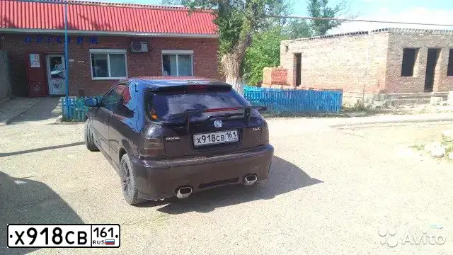Фото автомобиля HONDA CIVIC, 1997 — госномер Х918СВ161. Цвет: КРАСНЫЙ ТЕМНЫЙ