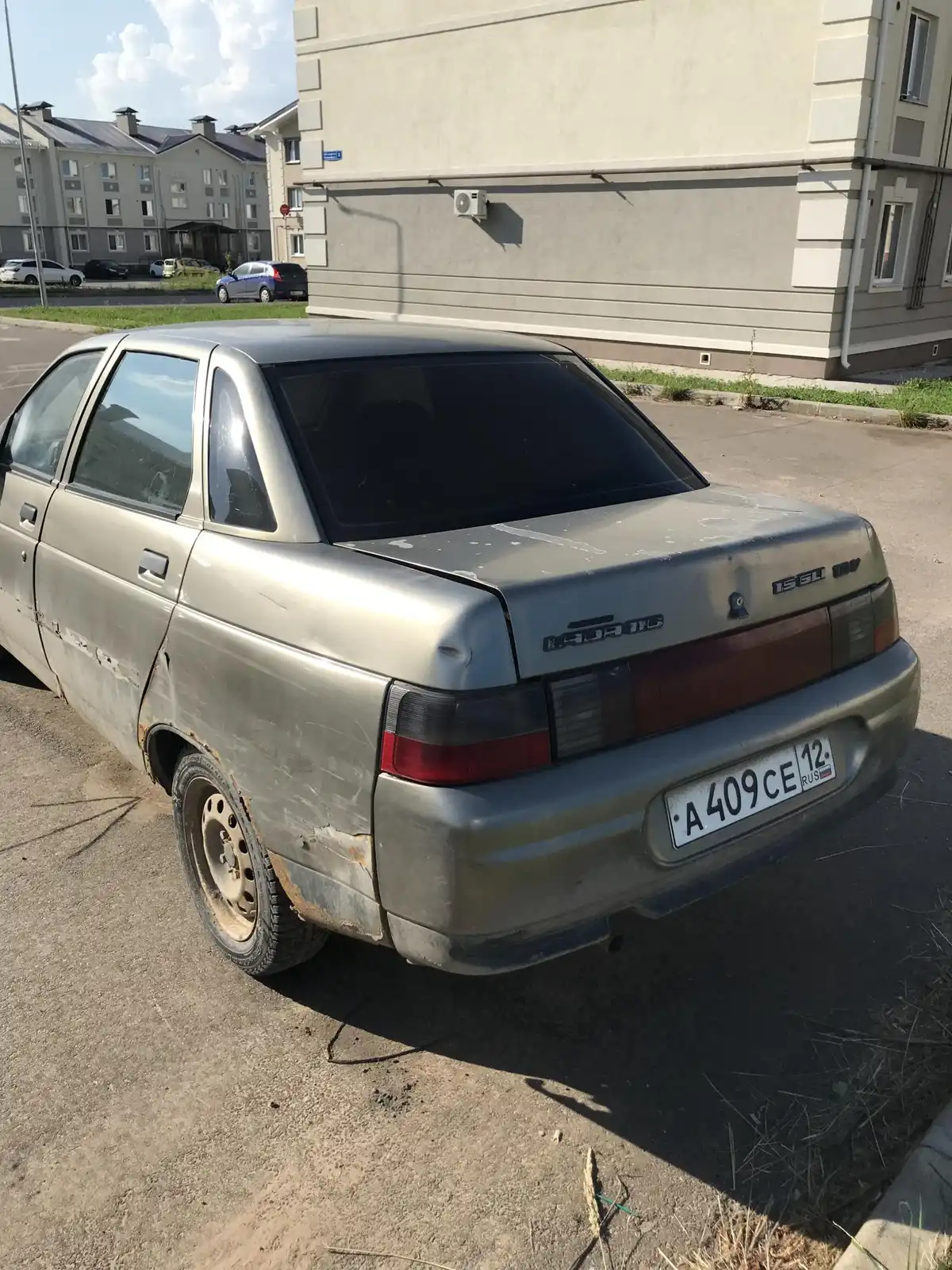 Фото автомобиля LADA 2110, 2001 — госномер А409СЕ12. Цвет: СЕРЕБР.СЕРО-ЗЕЛЕНЫЙ