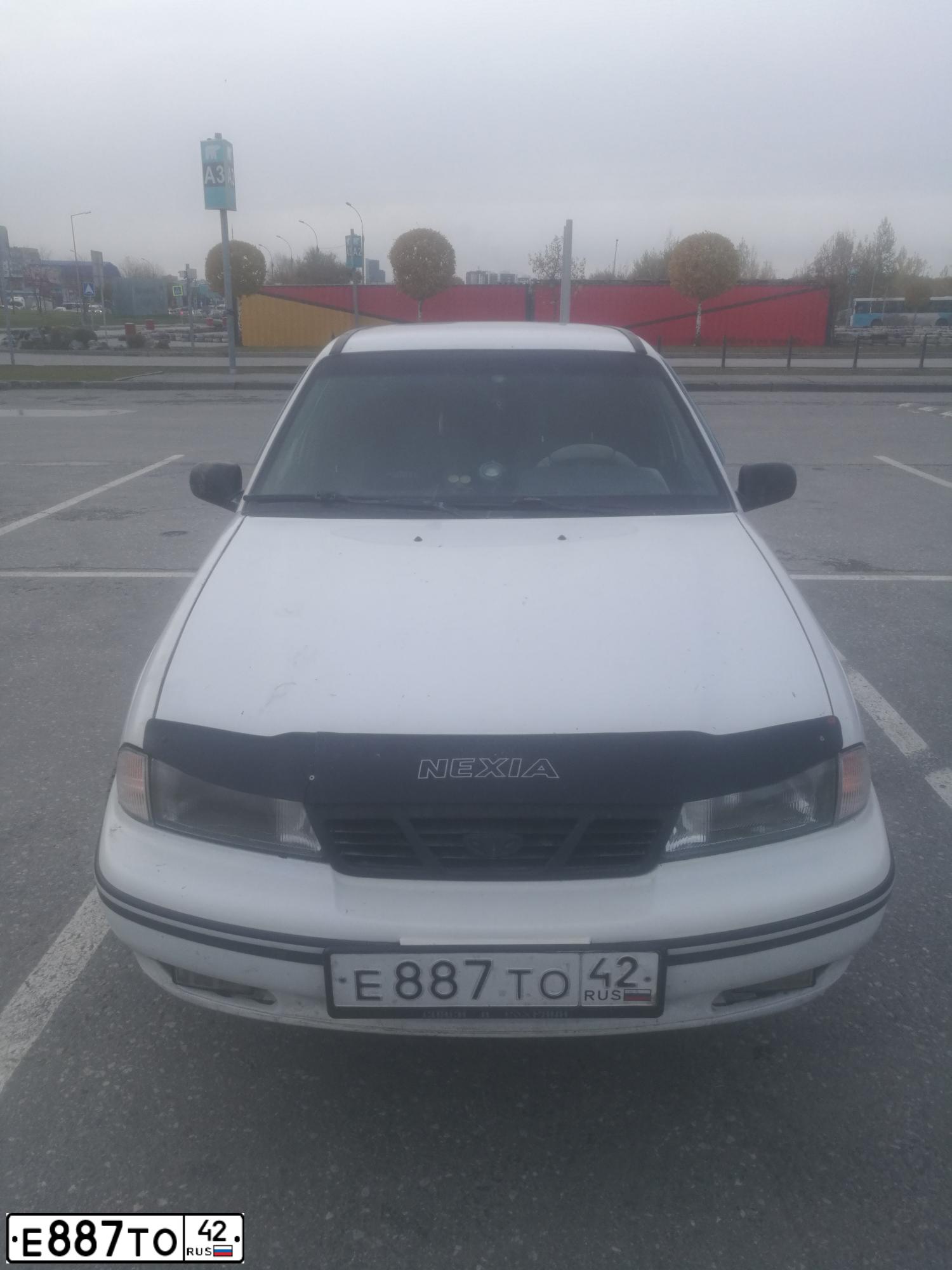 Фото автомобиля DAEWOO O NEXIA, 2005 — госномер М181ВО154. Цвет: Белый