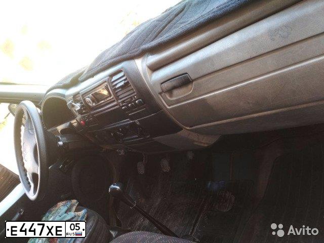 Фото автомобиля GAZ 3302 EL, 2005 — госномер Е447ХЕ05. Цвет: БЕЛЫЙ