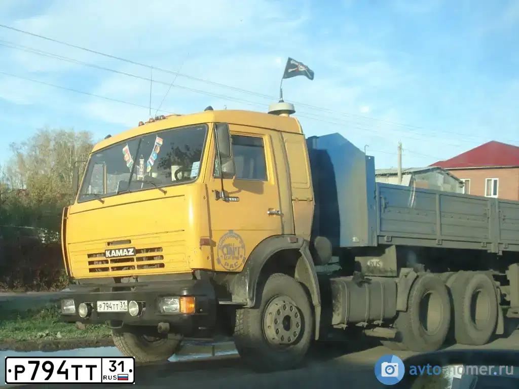 Фото автомобиля KAMAZ 54115 /6X4/, 2007 — госномер У021КС761. Цвет: Оранжевый
