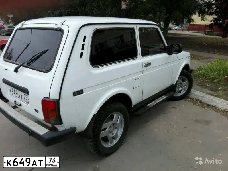 Фото автомобиля LADA 2121 NIVA, 1999 — госномер К649АТ73. Цвет: ЯРКО-БЕЛЫЙ