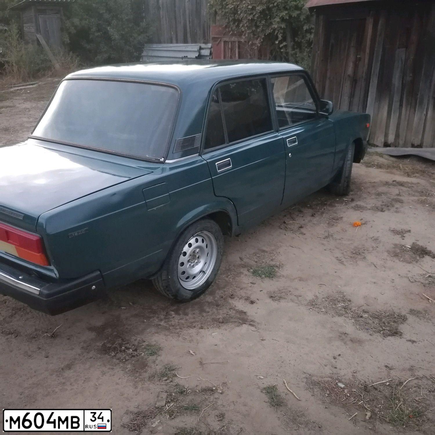 Фото автомобиля LADA 2107 LADA, 2003 — госномер В857УР134. Цвет: СИНЕ ЗЕЛЕНЫЙ