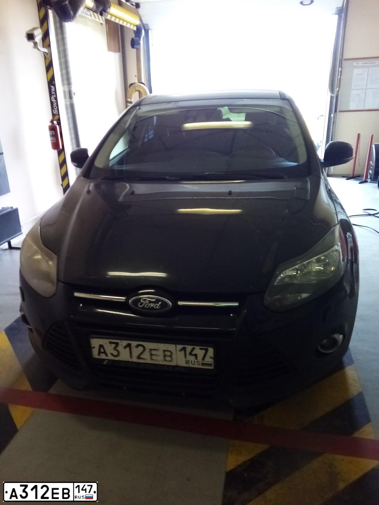 Фото автомобиля FORD FOCUS, 2014 — госномер Т212ЕА178. Цвет: ЧЕРНЫЙ