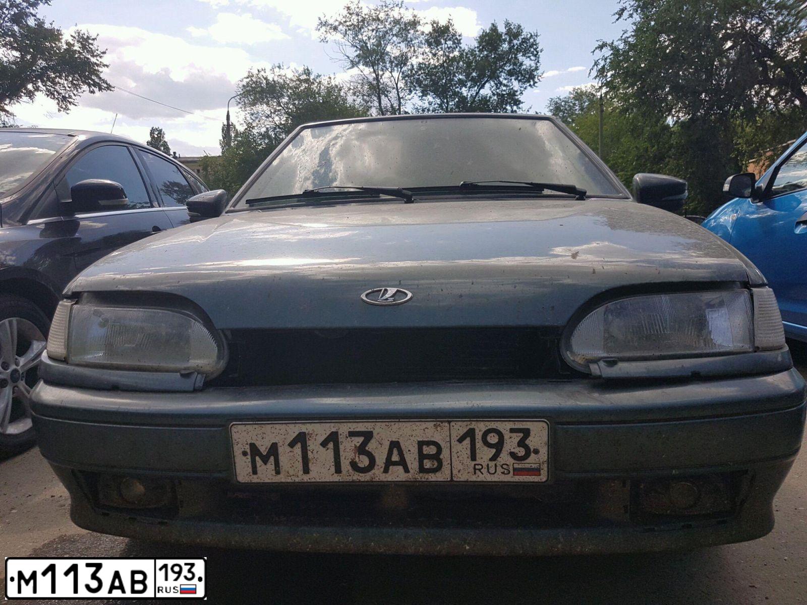Фото автомобиля LADA 2114, 2011 — госномер Е763УР30. Цвет: Серо-сине-зеленый