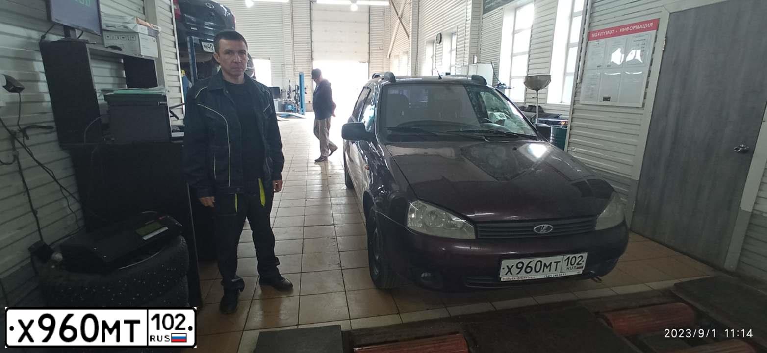 Фото автомобиля LADA KALINA, 2012 — госномер К702ХТ186. Цвет: ТЕМНО-ВИШНЕВЫЙ