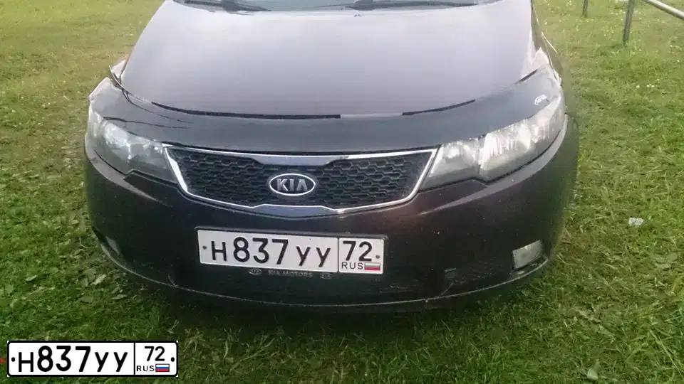 Фото автомобиля KIA CERATO, 2011 — госномер Н837УУ72. Цвет: ТЕМНО-ВИШНЕВЫЙ