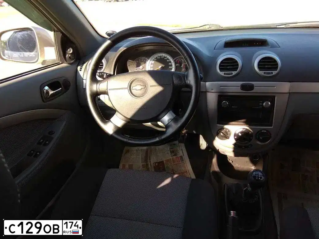 Фото автомобиля CHEVROLET LACETTI, 2011 — госномер Т392НТ196. Цвет: БЕЖЕВЫЙ