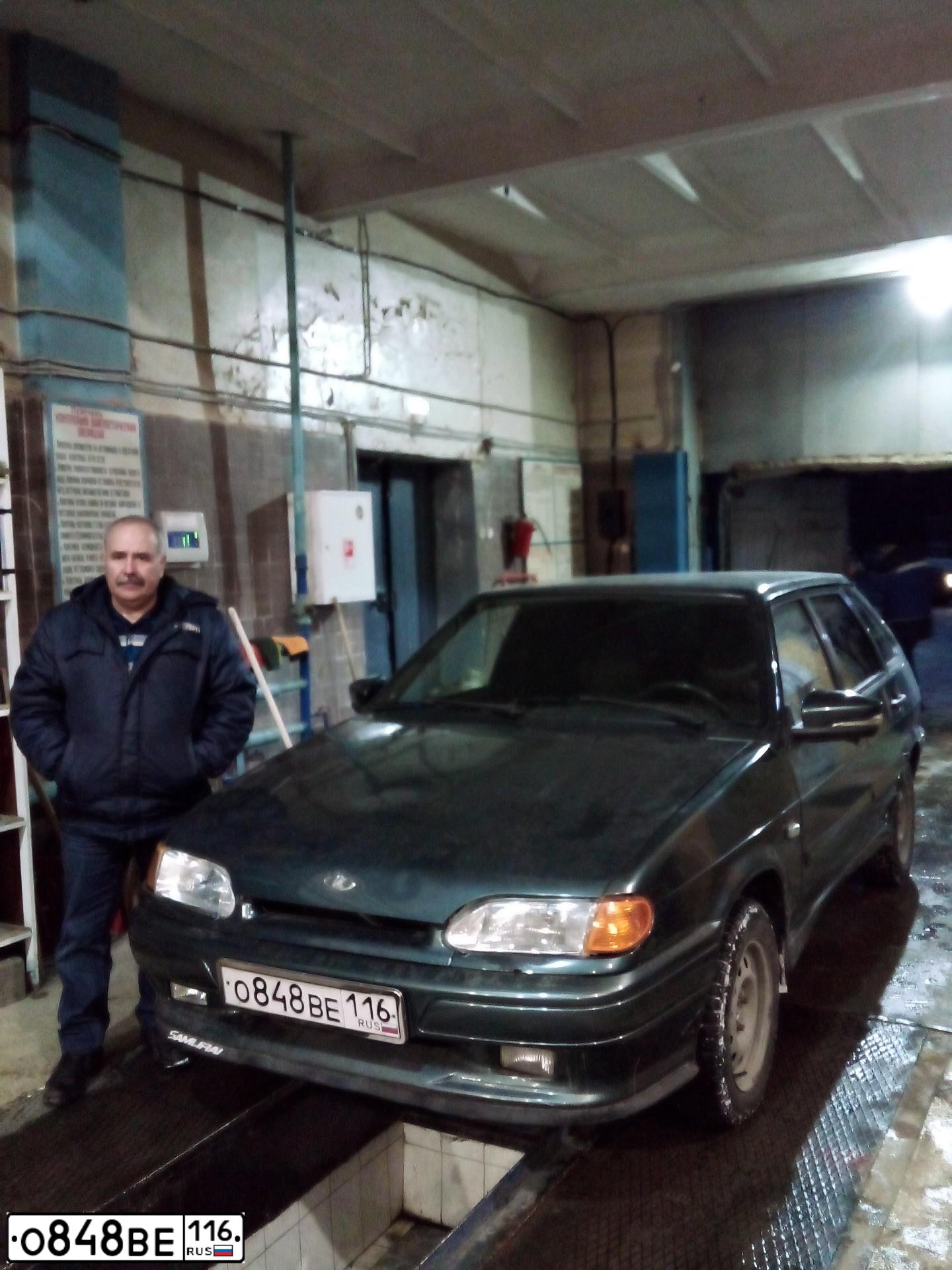 Фото автомобиля LADA 211440-26, 2011 — госномер Е582ОК790. Цвет: Серо-сине-зеленый