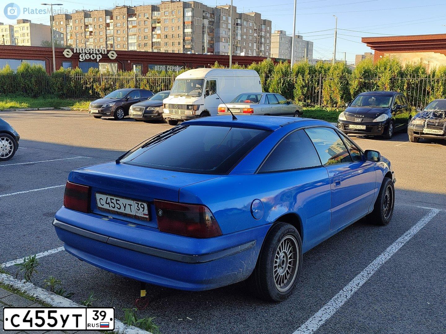 Фото автомобиля OPEL CALIBRA, 1991 — госномер С455УТ39. Цвет: синий
