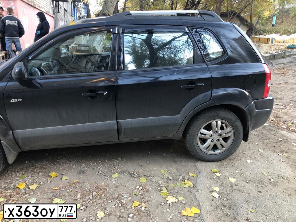 Фото автомобиля HYUNDAI TUCSON, 2005 — госномер К260ОН164. Цвет: ЧЕРНЫЙ
