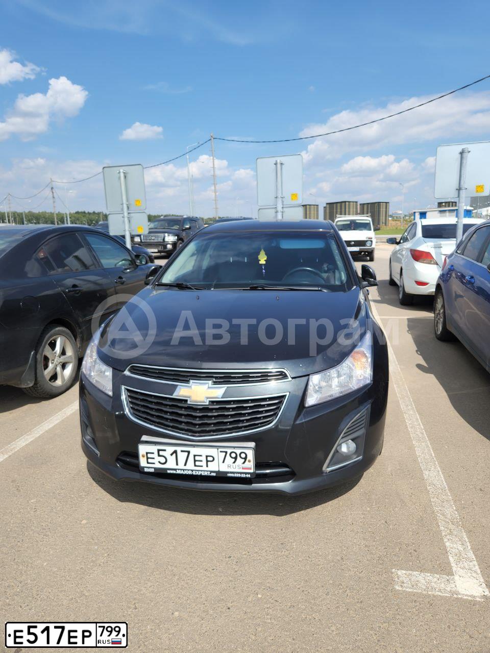 Фото автомобиля CHEVROLET CRUZE, 2013 — госномер Е261ВВ777. Цвет: ЧЕРНЫЙ МЕТАЛЛИК