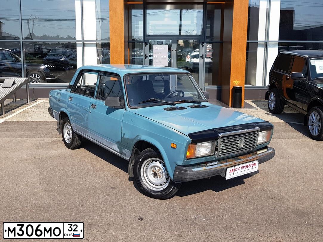 Фото автомобиля LADA 2107, 2003 — госномер М306МО32. Цвет: СЕРО-СИНИЙ