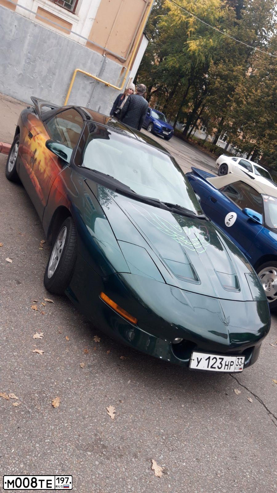 Фото автомобиля PONTIAC FIREBIRD, 1987 — госномер М376НР10. Цвет: ЧЕРНЫЙ