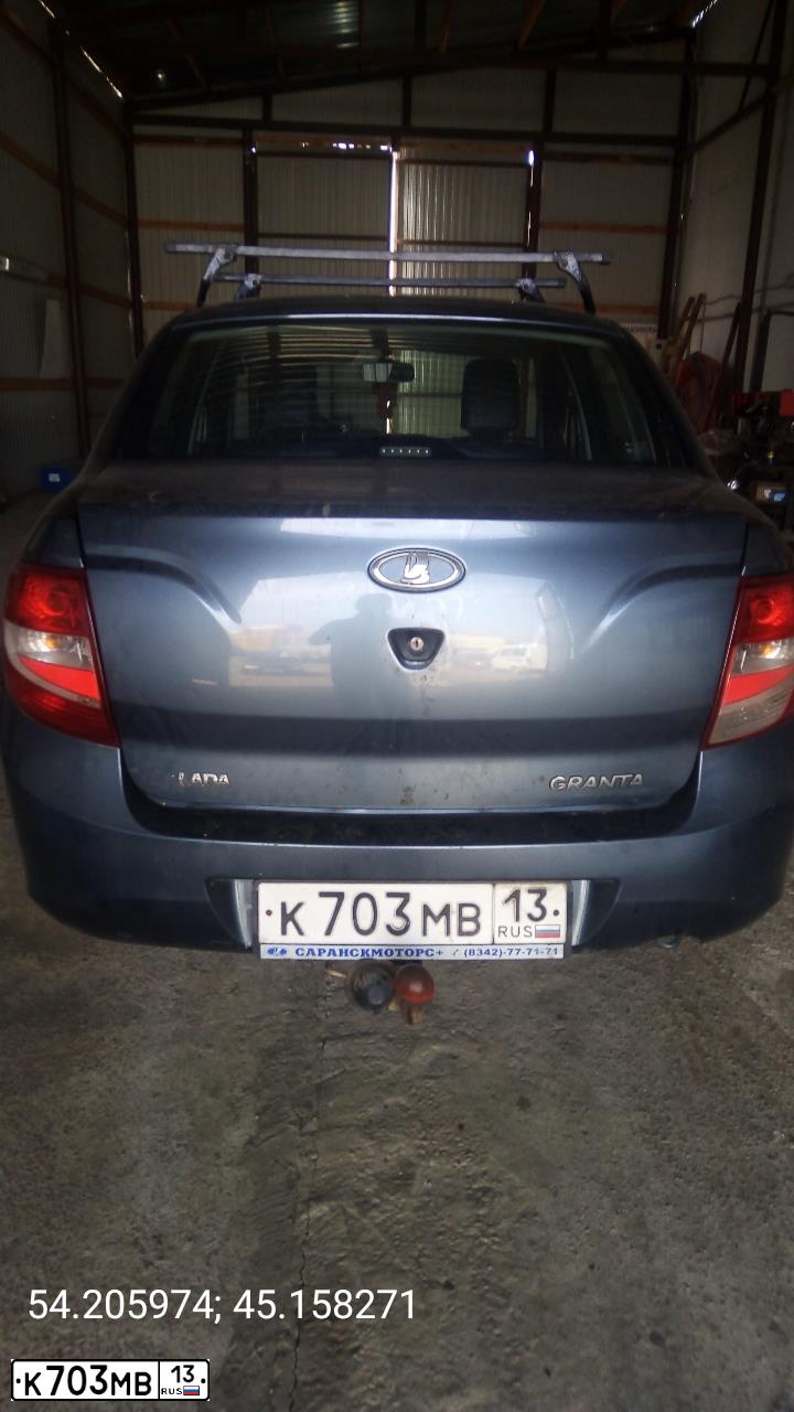 Фото автомобиля LADA 2190 GRANTA, 2014 — госномер К703МВ13. Цвет: СЕРО СИНИЙ