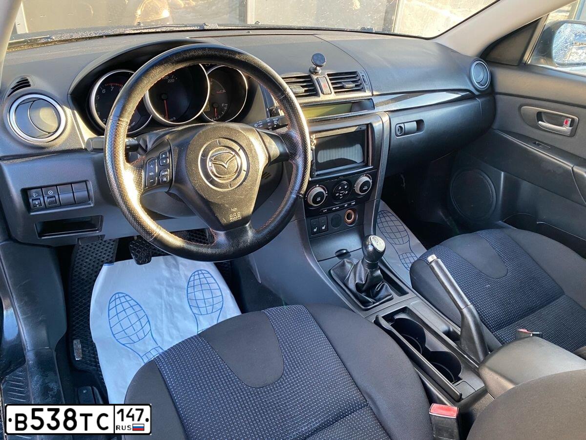Фото автомобиля MAZDA A 3, 2005 — госномер К198ТВ198. Цвет: ЧЕРНЫЙ