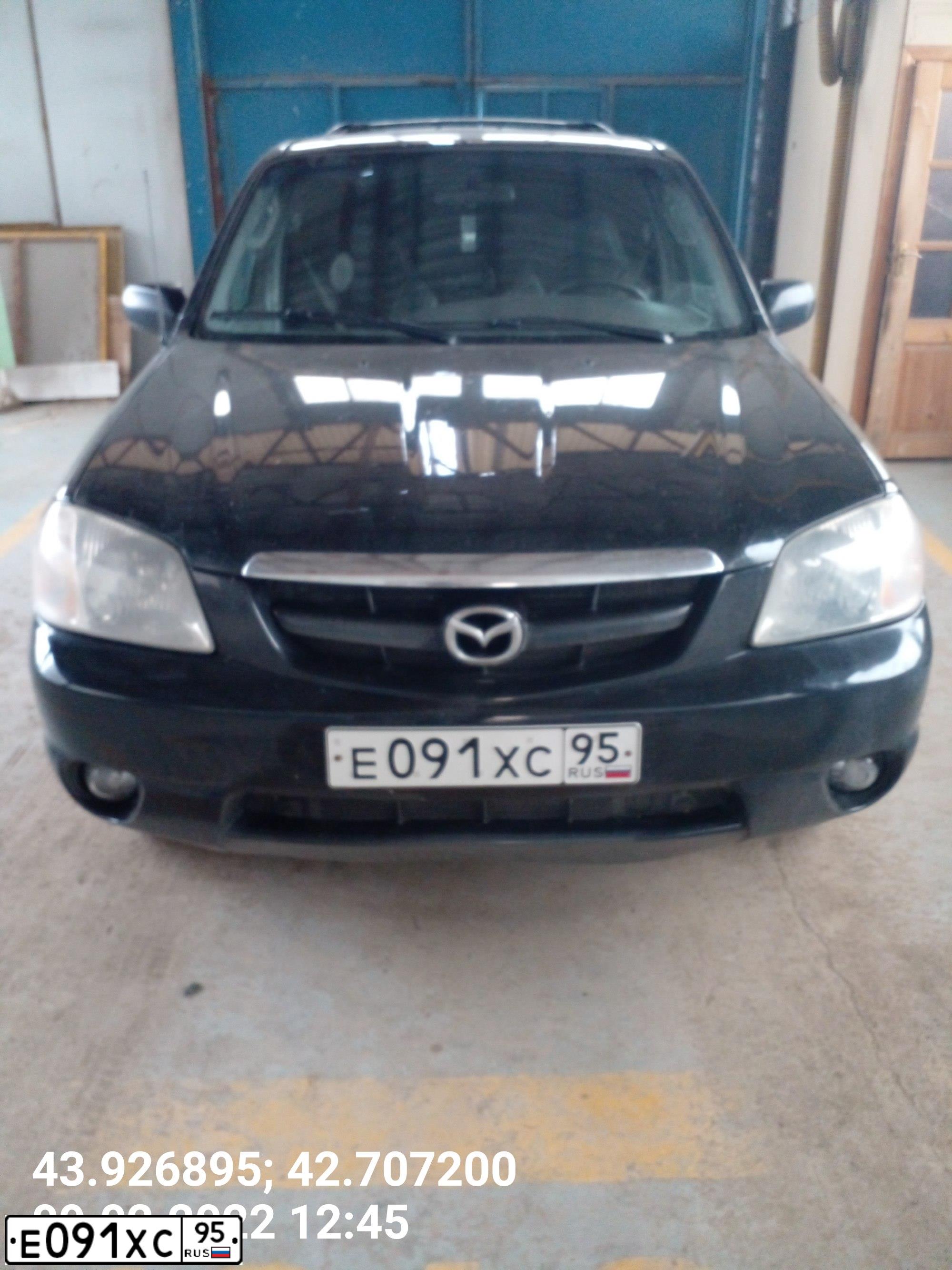 Фото автомобиля MAZDA TRIBUTE, 2001 — госномер В153ЕТ126. Цвет: ЧЕРНЫЙ