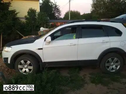 Фото автомобиля CHEVROLET CAPTIVA, 2012 — госномер Х799СМ69. Цвет: Белый