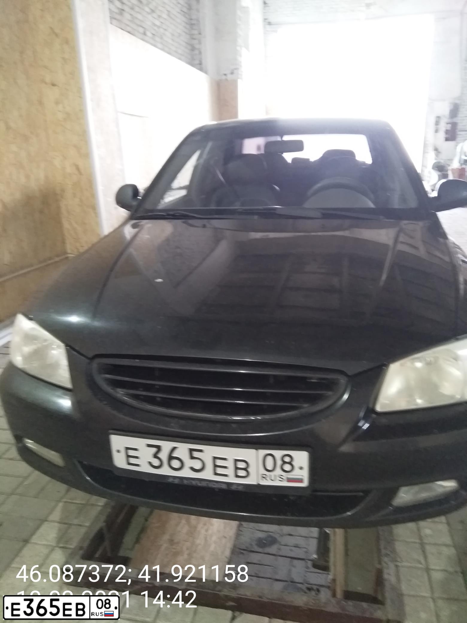 Фото автомобиля TAGAZ ACCENT, 2009 — госномер Е365ЕВ08. Цвет: ЧЕРНЫЙ