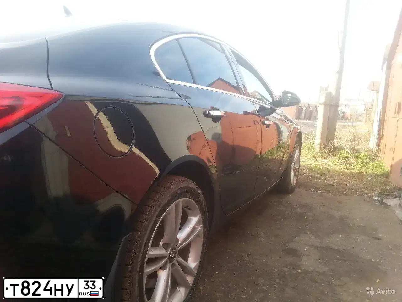 Фото автомобиля OPEL INSIGNIA, 2011 — госномер М110АР76. Цвет: ЧЕРНЫЙ