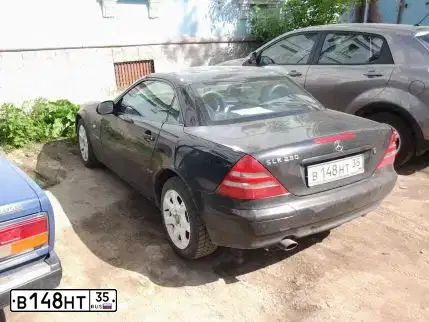Фото автомобиля МЕРСЕДЕСSLК230К MODEL, 1998 — госномер Т310СТ174. Цвет: ЧЕРНЫЙ
