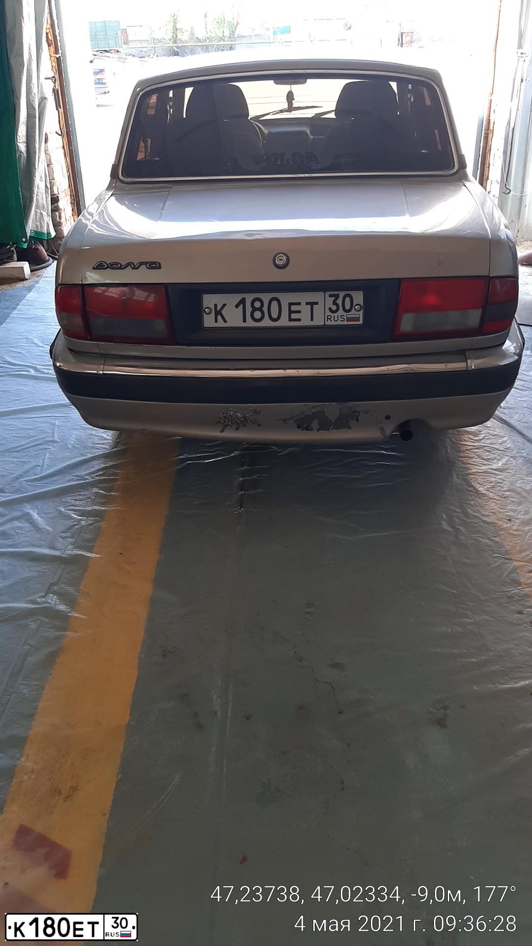 Фото автомобиля GAZ 3110 WOLGA, 2006 — госномер К180ЕТ30. Цвет: СЕРО-ЖЕЛТЫЙ