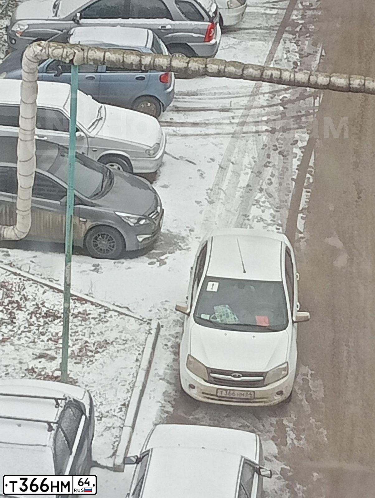 Фото автомобиля LADA GRANTA, 2013 — госномер М959ЕС164. Цвет: Белый