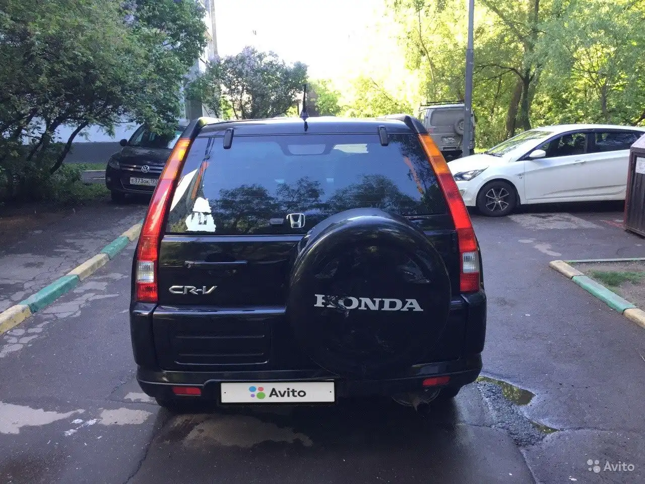 Фото автомобиля VOLKSWAGEN TIGUAN, 2011 — госномер Е373ОК197. Цвет: ЧЕРНЫЙ