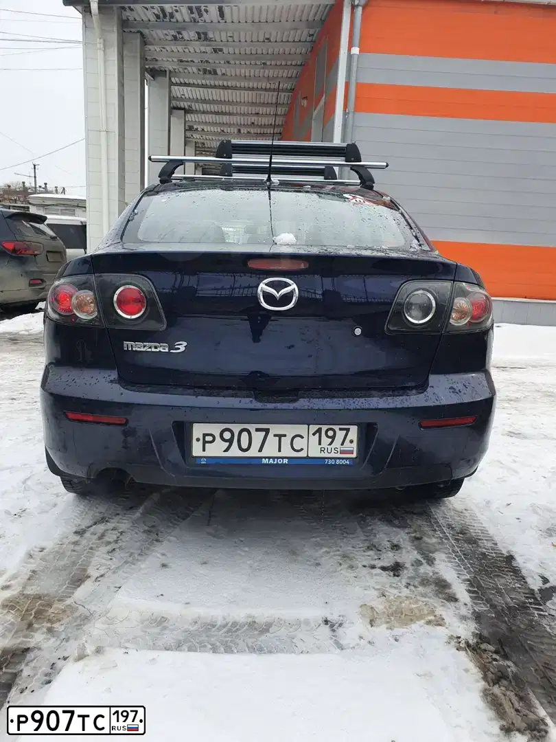 Фото автомобиля MAZDA 3, 2008 — госномер В940УТ174. Цвет: ТЕМНО-СИНИЙ