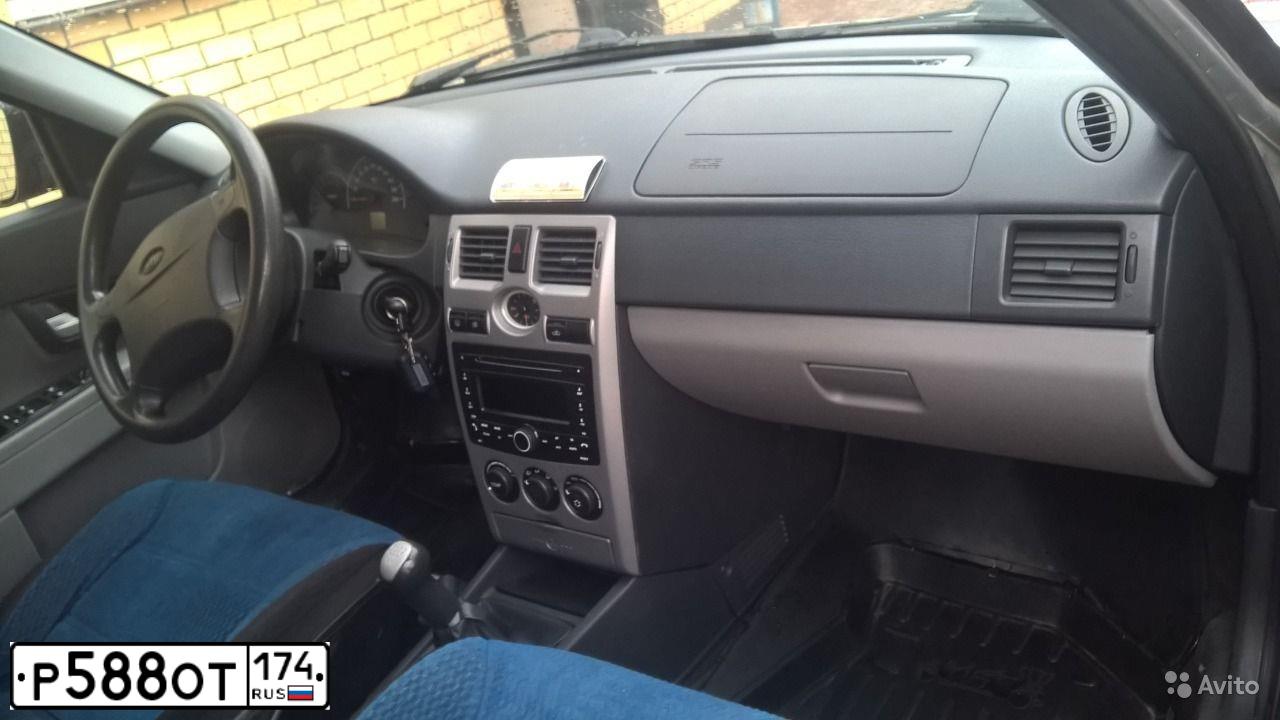 Фото автомобиля LADA 2172 PRIORA, 2012 — госномер Р588ОТ174. Цвет: СВЕТЛО-СЕРЕБРИСТЫЙ  МЕТАЛЛИК
