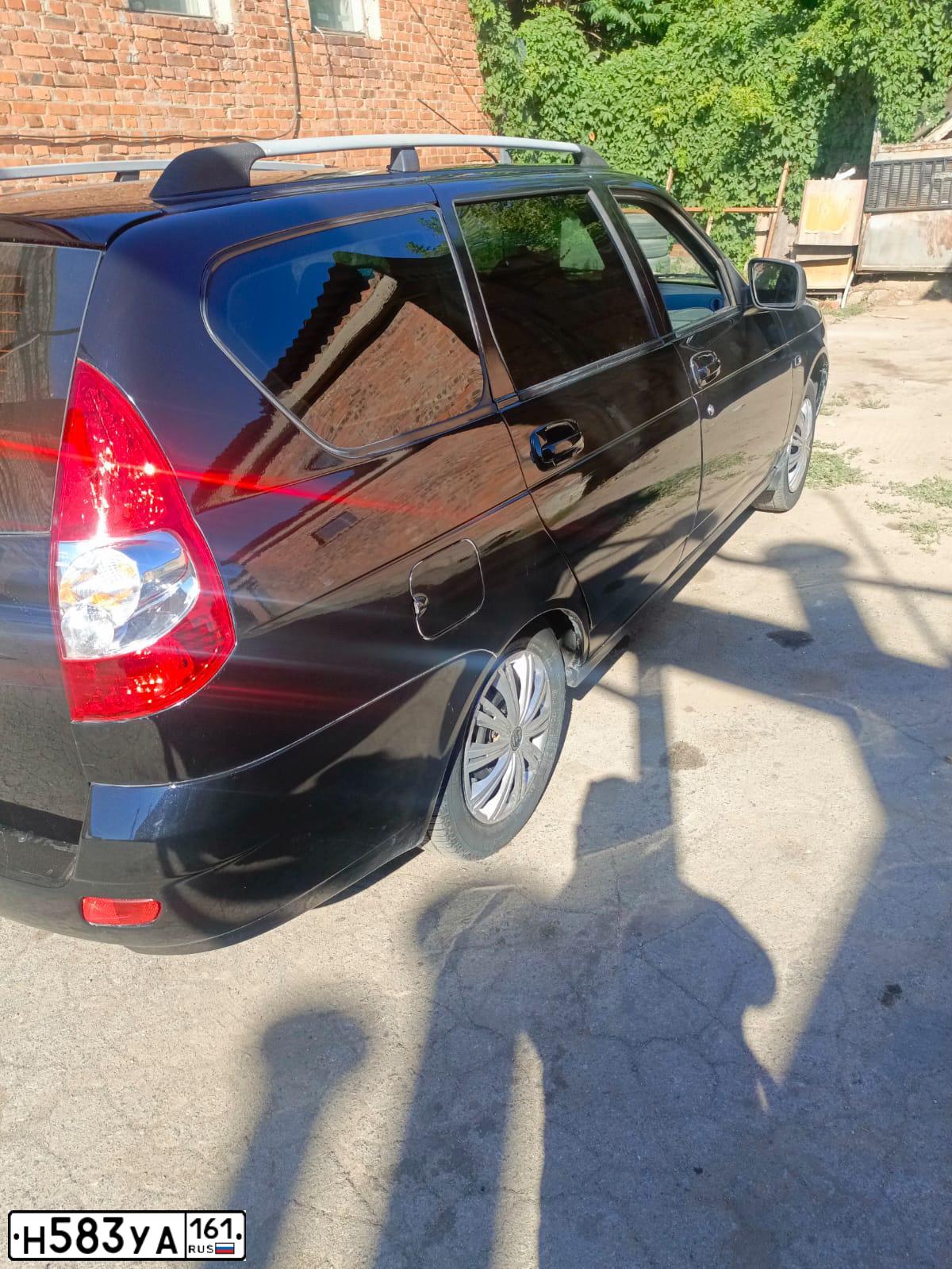 Фото автомобиля LADA 2171 PRIORA, 2011 — госномер Н583УА161. Цвет: Сине-Черный