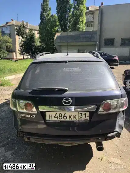 Фото автомобиля MAZDA 6, 2002 — госномер Н486КК31. Цвет: синий