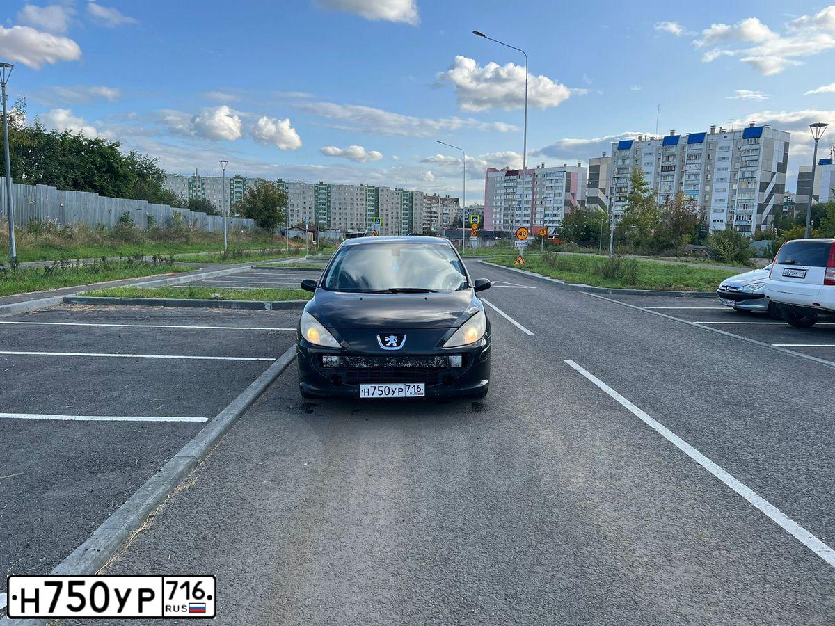 Фото автомобиля PEUGEOT 307, 2007 — госномер В338АА716. Цвет: ЧЕРНЫЙ