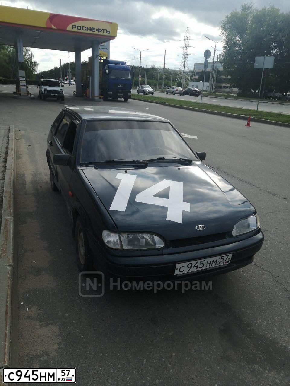 Фото автомобиля LADA 2114 SAMARA, 2004 — госномер С945НМ57. Цвет: Темно-зеленый