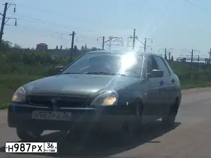 Фото автомобиля LADA 2172 PRIORA, 2011 — госномер Н987РХ36. Цвет: СЕРО-СИНЕ-ЗЕЛЕНЫЙ